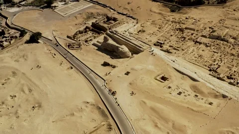 Aerial View of the Great Sphinx and Giza Pyramids in Egypts History Stock Footage 320973124