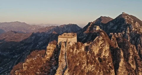 Aerial View of the Great Wall Covered with Snow under Sunset Stock Footage 121048126