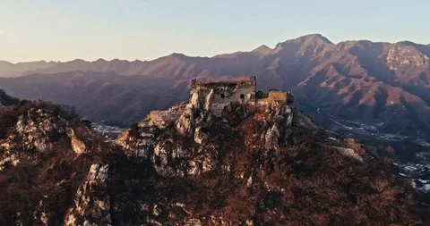 Aerial View of the Great Wall Covered with Snow under Sunset Stock Footage 121048252