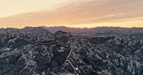 Aerial View of the Great Wall Covered with Snow under Sunset Stock Footage 121546507