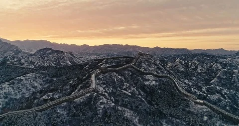 Aerial View of the Great Wall Covered with Snow under Sunset Stock Footage 121546588