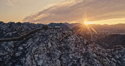 Aerial View of the Great Wall Covered with Snow under Sunset Stock Footage 121547534