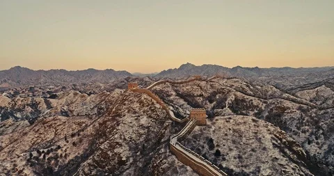 Aerial View of the Great Wall Covered with Snow under Sunset Stock Footage 121547636