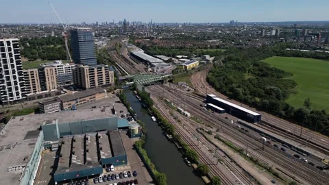 Aerial view of the Great Western Main Line &amp; Grand Union Canal, London, UK. Stock Footage 280583181