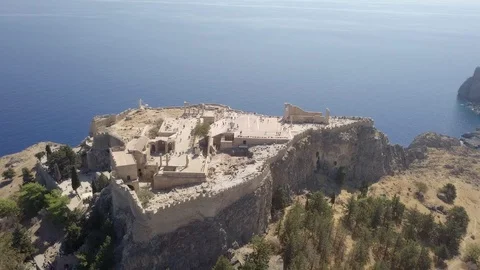 Aerial view of the greek town of Lindos, Rhodes and the Acropolis. Stock Footage