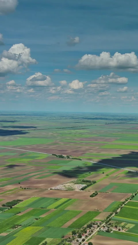 Aerial view of green agricultural fields and farmland Stock Footage 346654415