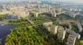 Aerial view of green city residential area and beautiful river HD Footage