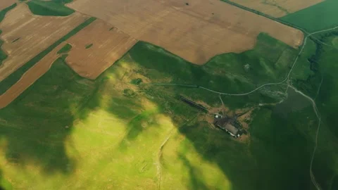 Aerial view of green countryside fields Stock Footage 343925875