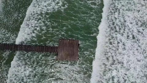 Aerial view of green emerald waves relentlessly Stock Footage 346504478