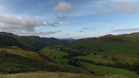 Aerial view of a green English countryside valley in Cumbria. Stock Footage