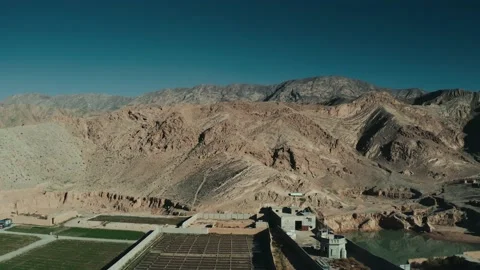 Aerial view of green fields and mountains in Quetta Pakistan Stock Footage 219781273