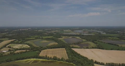 Aerial view of green fields and farmland, France. Stock Footage 284842629