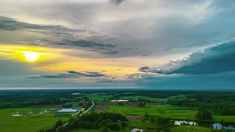Aerial view of green fields and dramatic sunset sky in Latvia. Stock Footage 339963561