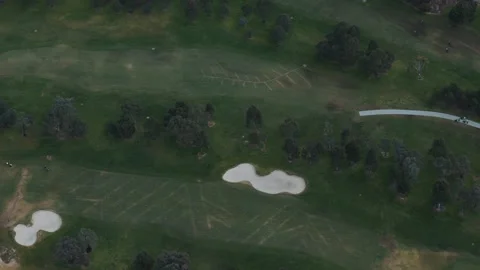 Aerial view of green golf course with sand bunkers 스톡 동영상 342579277