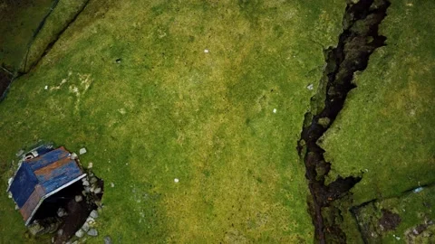 Aerial view of green landscape in Faroe Islands Stock Footage 141664088