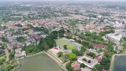 Aerial view of a green open spaced Stock Footage 235541219