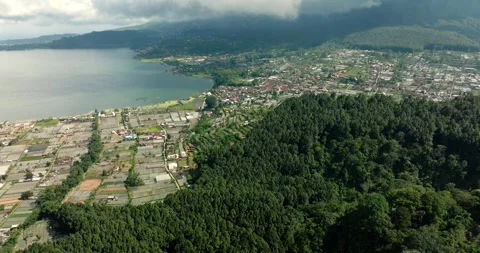 Aerial view of a green valley with fields and houses. Bedugul, Bali Stock Footage 277028935