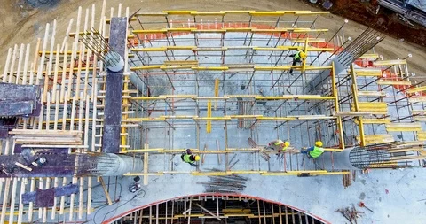 Aerial view of a group of construction workers at construction site Stock Footage 86236331