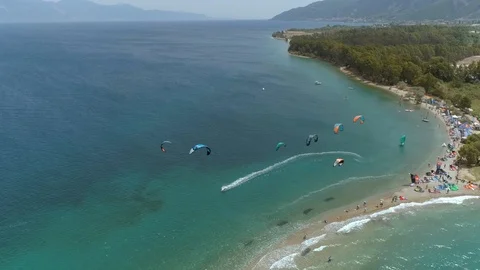 Aerial view of group doing windsurfing in the Gulf of Patras, Greece. Stock Footage 99827403