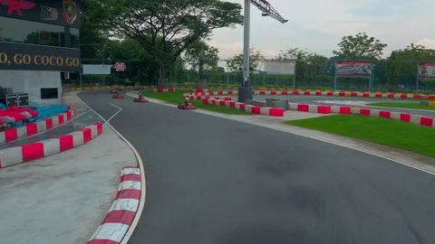 Aerial View Of A Group Driving Kart On A Speedway, Singapore Vídeos de archivo 130150183