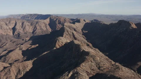 Aerial view of a group of mountains in arid place Stock Footage 191142634