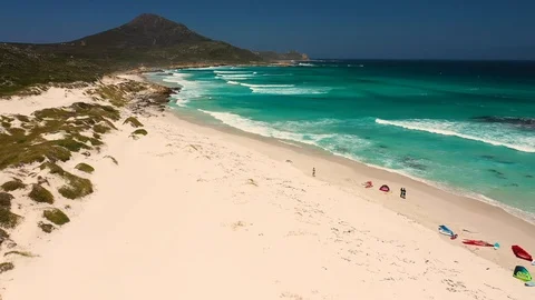 Aerial view of group practicing windsurfing at Platboom beach, South Africa. Video stock 120722688