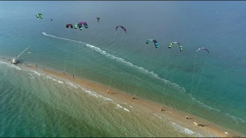 Aerial view of group preparing to windsurfing in the Gulf of Patras, Greece. Stock Footage 99827001