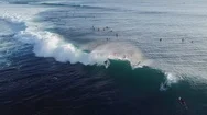 Aerial View Of Group Of Surfers In The Ocean. Stock Footage