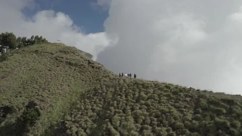AERIAL VIEW GROUP WALKING IN MOUNT RINJANI Stock Footage 231331183
