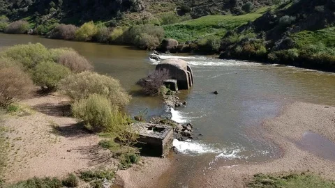 Aerial view Guadiana river with the old traditional watermills Stock Footage 88409307