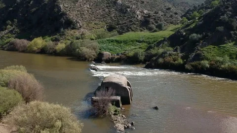 Aerial view Guadiana river with the old traditional watermills Stock Footage 88409356