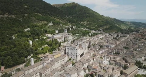 Aerial view of Gubbio rooftops and hills, Italy. Stock Footage 313556821