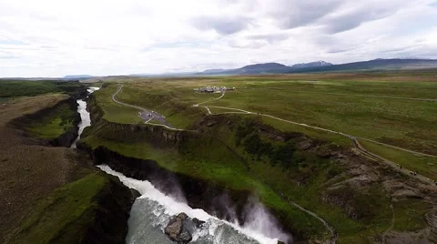 Aerial view of the Gullfoss Waterfall flying to the house cafe Stock Footage 52400136