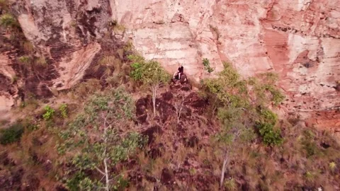 Aerial view of guy on a rock in Chapada das Mesas in Brazil Stock Footage 168403667