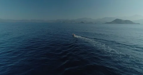 Aerial view of a guy in a small boat on the Turkish coast. Turkey. Stock Footage 93252807
