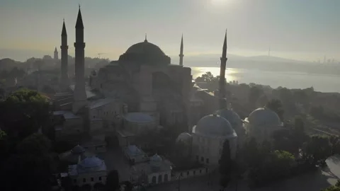 Aerial view of Hagia Sofia Mosque, Sunrise time, Istanbul historical center and Stock Footage 294951387