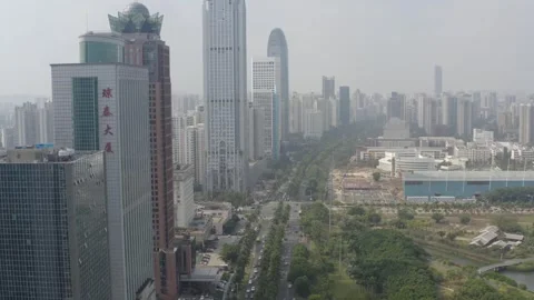 Aerial View of Haikou City Skyline and Busy Roadway in Hainan, China Stock Footage 341703653
