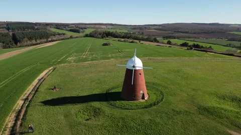 Aerial view of Halnaker windmill on Halnaker Hill West Sussex Stock Footage 238760468