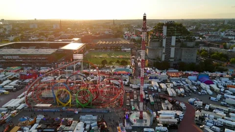 Aerial view of Hamburger Dom fairground at sunset, Germany. Stock Footage 344968177
