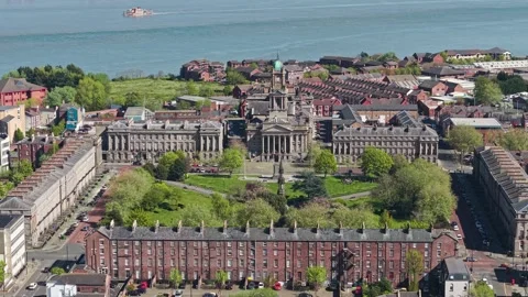 Aerial view of Hamilton Square and Birkenhead Town Hall with River Mersey Stock Footage 334800209