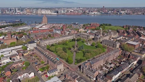 Aerial view of Hamilton Square Birkenhead with River Mersey and Liverpool Stock Footage 334800096
