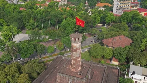 Aerial View of Hanoi Flag Tower with Vietnamese Flag and Lush Greenery Stock Footage 341807629