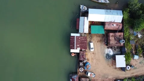 Aerial view of the harbor area of fuel tankers on a river close to the sea Video stock 246745896