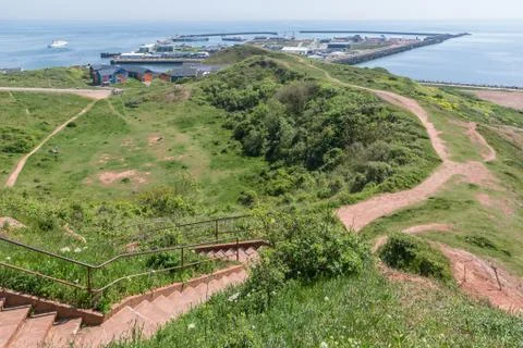 Aerial view harbor seen from cliffs of German island Helgoland. Stock Photos