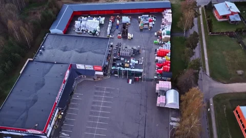 Aerial view of a hardware store outdoor warehouse with building materials Stock Footage 335893474