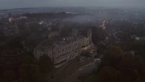 Aerial view of heading towards Warwick Castle famous British landmark at night Video stock 251039718