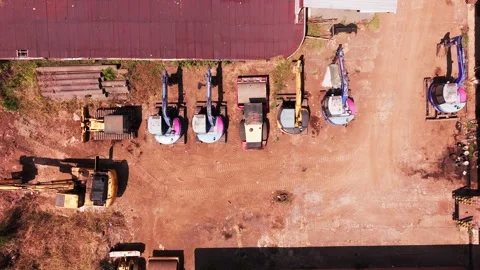 Aerial View of Heavy Construction Vehicles at Earthwork Site 스톡 동영상 344088786