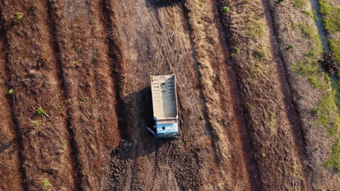 Aerial view of heavy earthmovers in construction site. Stock Footage 232078329