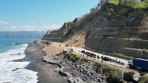 Aerial view of heavy excavators clearing a massive landslide Stock Footage 345201696