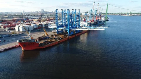 Aerial View of Heavy Load Carrier Ship Delivering Gantry Cranes Philadelphia Stock Footage 87897136